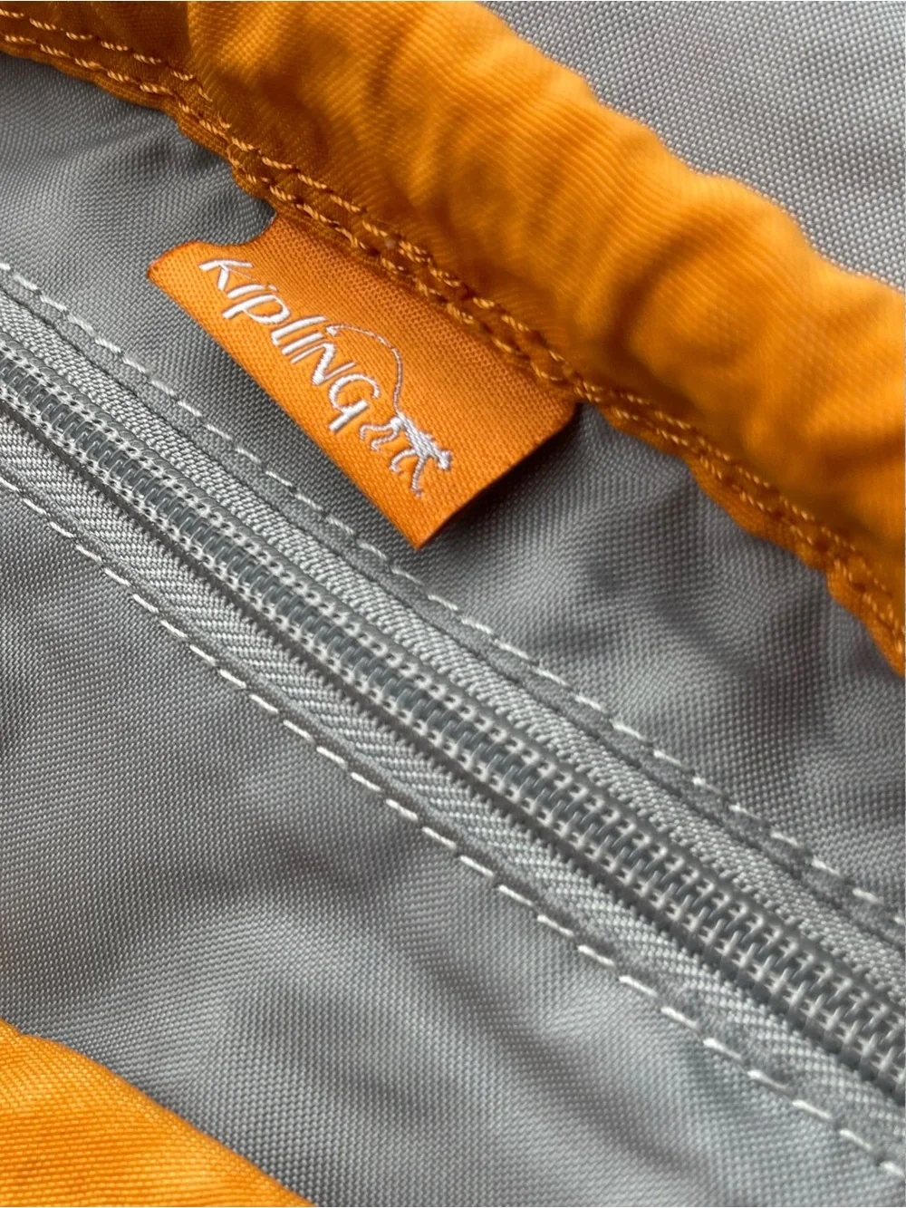 Kipling Vintage Crinkle Nylon Cargo Drawstring Mini Backpack – Orange